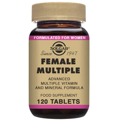 Solgar Female Multiple bottle on table illustrating the compact 120-tablet packaging.