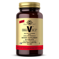 Solgar VM-75 bottle with label visible on table for daily wellness support.