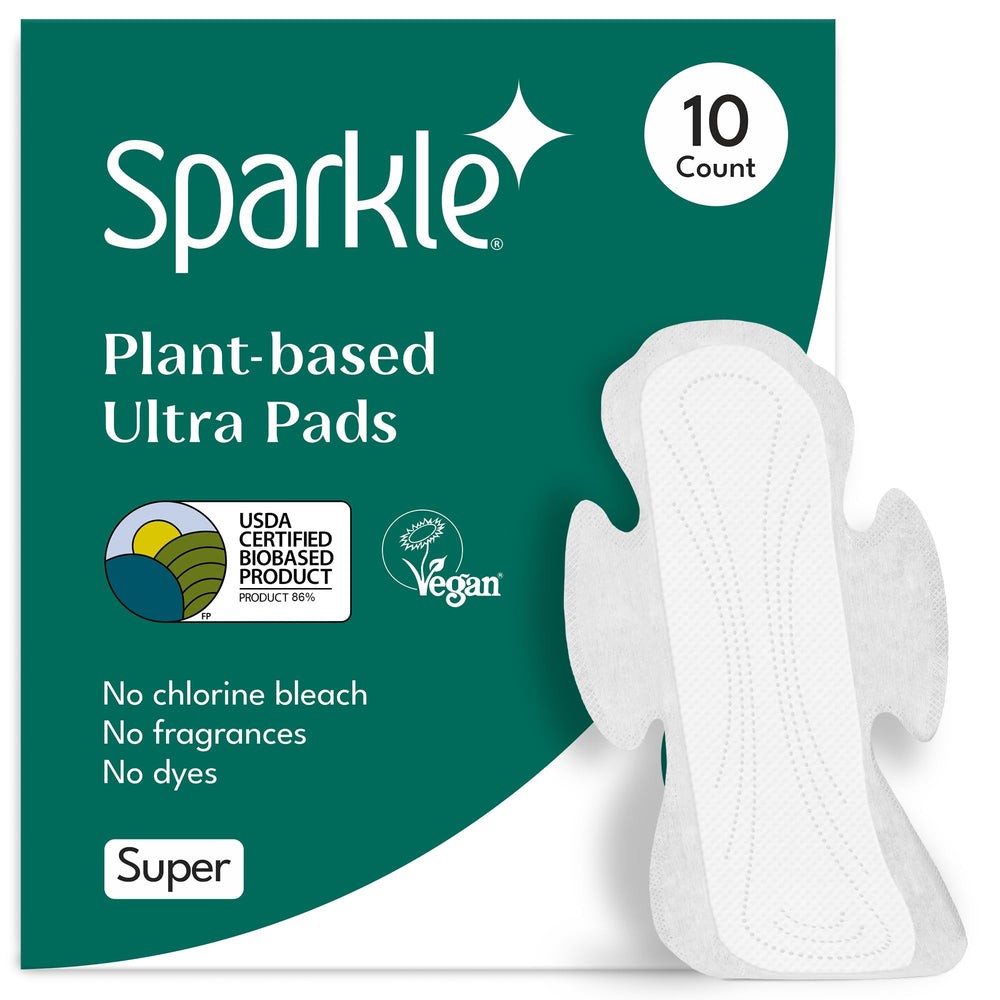 Sparkle Ultra Pads packaging on shelf highlights plant-based design.