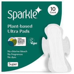 Sparkle Ultra Pads packaging on shelf highlights plant-based design.