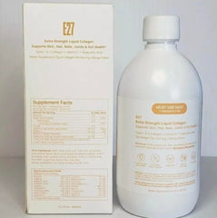 SpoiledChild collagen mango pour captured mid-pour into a glass
