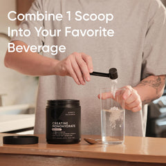 Sports Research Creatine Monohydrate powder dissolving quickly in water for easy post-workout mix.