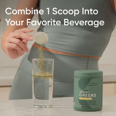 Pineapple Coconut Greens powder dissolved in glass of water