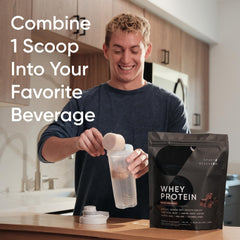 Sports Research Whey Protein being poured into a shaker for post-workout shake.