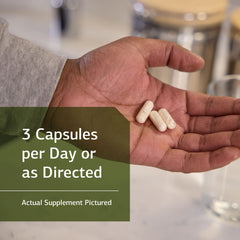 ProSynbiotic capsules shown next to the bottle cap for convenient use.
