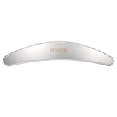 STICKON stainless steel gua sha sickle face for facial contouring and tension relief.