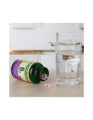 Close-up of B12 tablets dissolving, with delicious cherry flavor