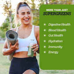 Sunfood Supergreens scoop in bowl, easy daily mix for smoothies.