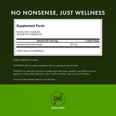 Close-up of Swanson Activated Charcoal capsules highlighting compact form.