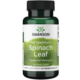 Swanson spinach leaf bottle close-up shows vegan capsules for simple daily nutrition.
