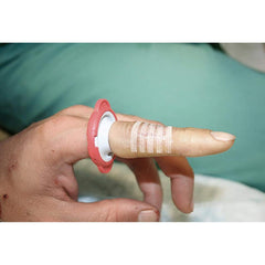 T-Ring sterile saline wipe keeps the wound clean before dressing.