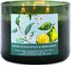 T&H Eucalyptus Bergamot 3-Wick Candle jar glows to create a fresh living space