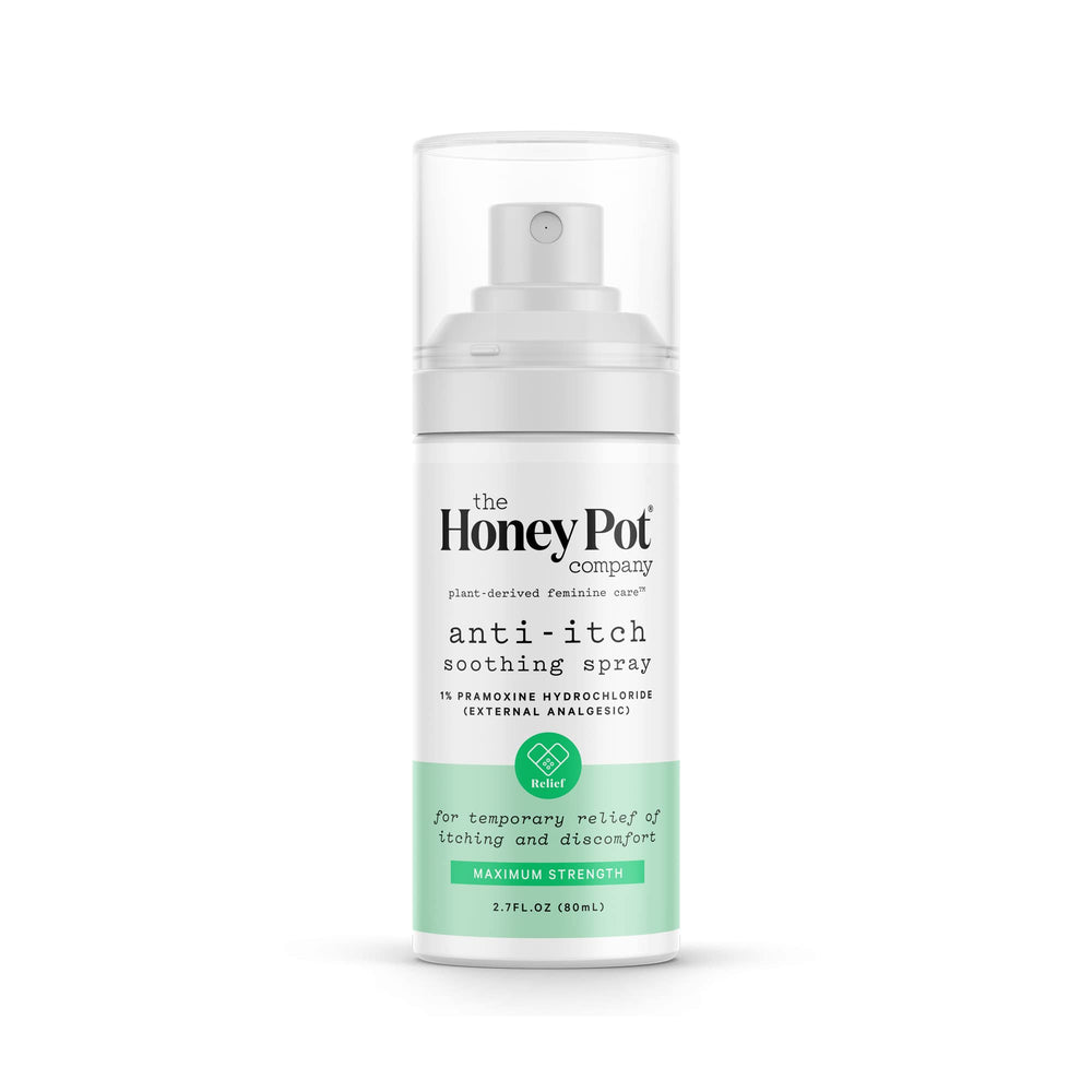 The Honey Pot Company feminine anti-itch spray bottle on bathroom counter for on-the-go relief.