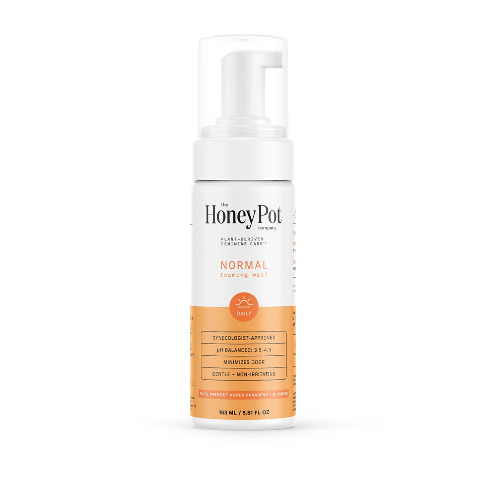 The Honey Pot feminine wash bottle pour showcases a gentle cleansing ritual for sensitive skin.