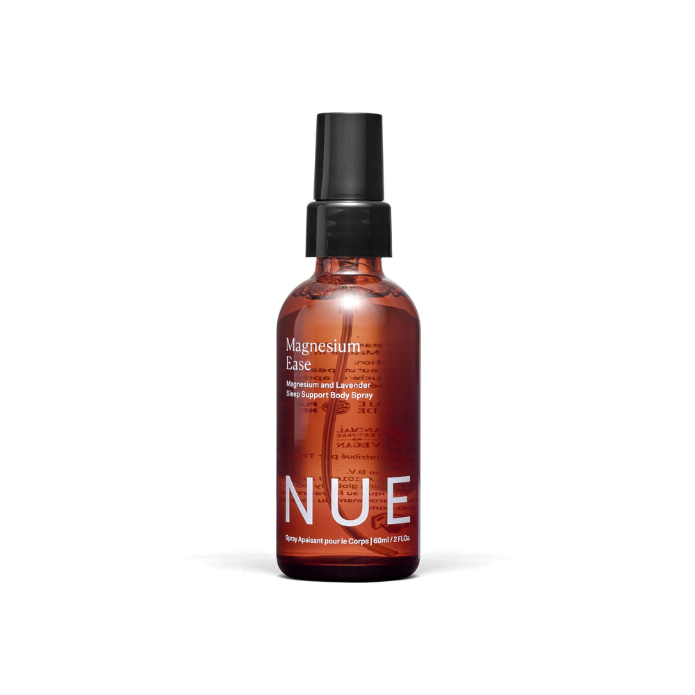The Nue Co Magnesium Ease spray bottle for soothing muscle tension after workouts.