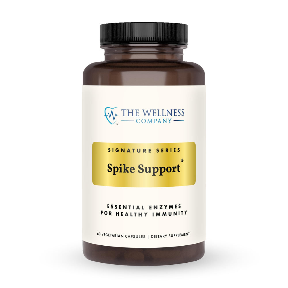 The Wellness Company Spike Support bottle label shows detox and immune support potential.