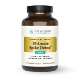The Wellness Company Ultimate Spike Detox bottle closeup showing clear capsules for daily immune support