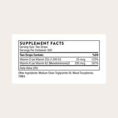 Thorne vitamin D and K2 liquid dispensing top showing controlled drop-by-drop application
