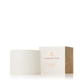 Thymes Frasier Fir candle in a wood grain ceramic jar for a premium winter look