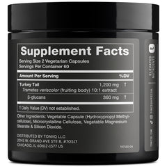 Toniiq Turkey Tail capsules beside water for simple daily use