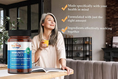 Ingredients panel on TotoNutrition Immunity Support Booster bottle highlighting Vitamin C and D3