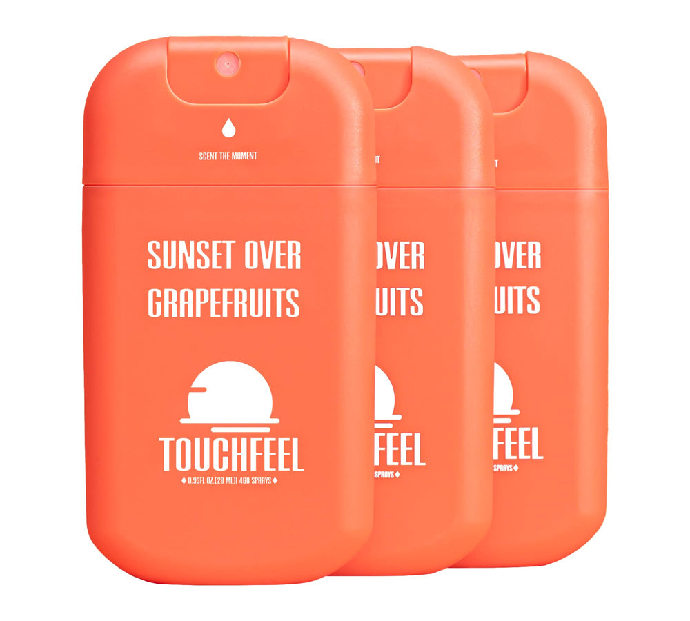 TOUCHFEEL Power Mist bottle showing sunset over grapefruits with refreshing fragrance