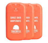 TOUCHFEEL Power Mist bottle showing sunset over grapefruits with refreshing fragrance