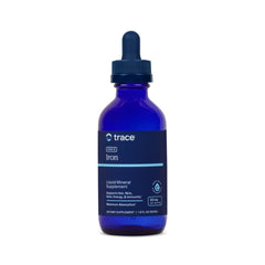 Trace Minerals Ionic Iron bottle on kitchen counter for daily energy support.