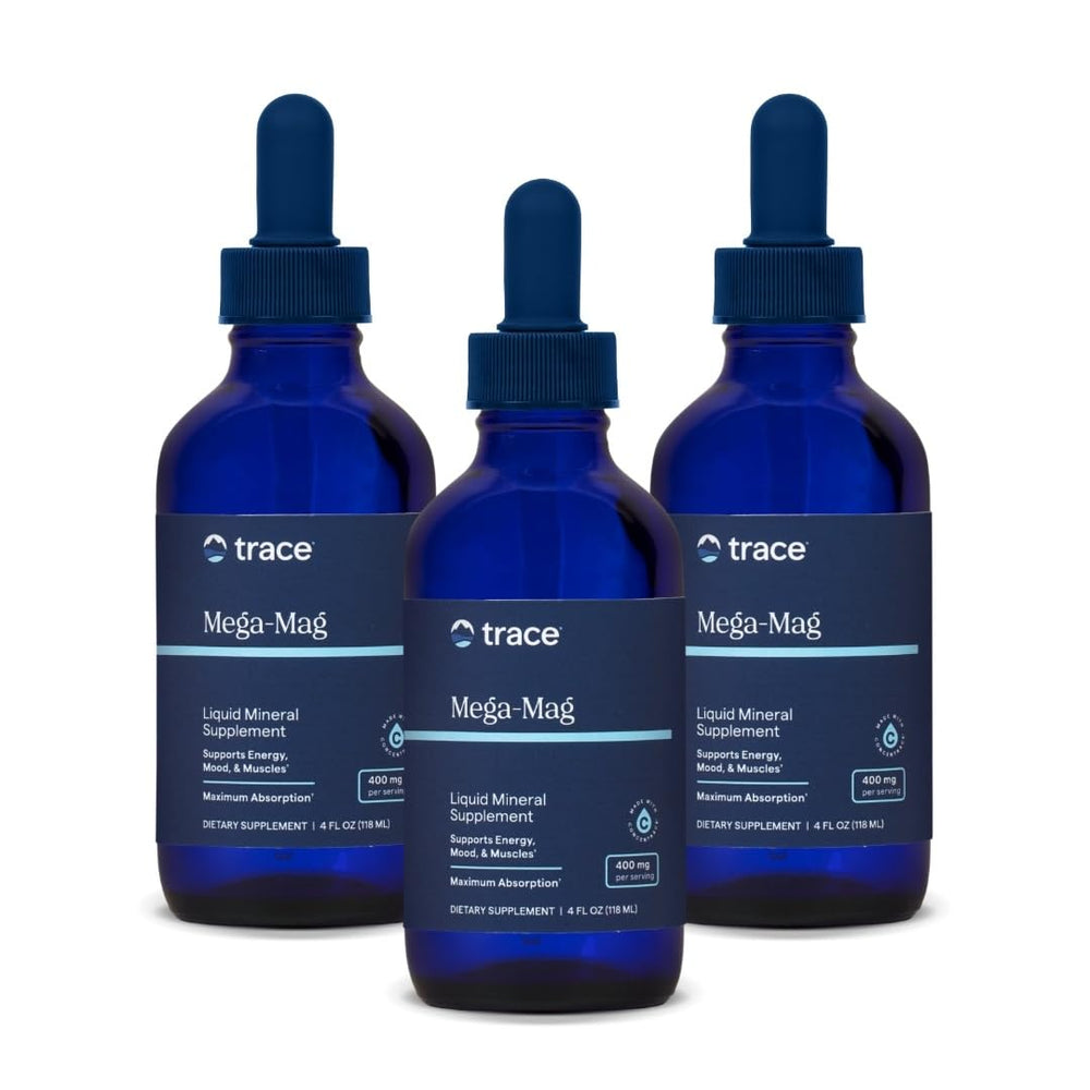 Trace Minerals Mega-Mag bottle in hand, highlighting easy daily magnesium drops for energy support.