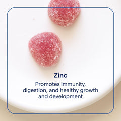 Trace Minerals Zinc Gummy gummies poured on a surface showing digestion support.