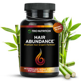 TRIO NUTRITION Hair Abundance bottle close-up supports daily hair growth goals.