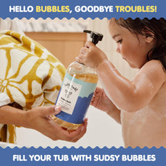TUBBY TODD bubble bath under running water creates foamy bubbles.