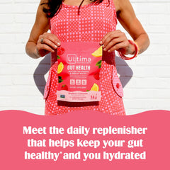 Ultima Replenisher dissolving stickpack in water delivering electrolytes and prebiotic fiber.