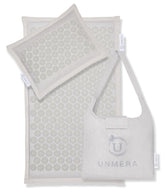UNMERA acupressure mat camellia nails close-up for soothing back tension and daily unwind