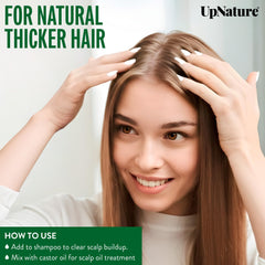 UpNature Tea Tree Oil drops on scalp for a refreshing hair care routine.