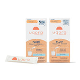 Uqora Flush unflavored packets beside water for daily urinary health support.