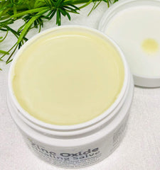 Gently applying Urban ReLeaf Zinc Oxide Salve to irritated skin