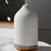 URPOWER ceramic diffuser with wood base enhances living room ambience