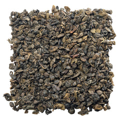 US Wellness Naturals loose tea in cup with golden liquor