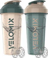 VELOMIX two-pack 28 oz shaker bottles in blue and beige for convenient protein mixing.