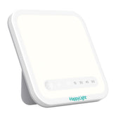 Verilux HappyLight Mini front view on a desk for daytime alertness