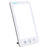 Verilux HappyLight Touch Plus on a desk delivering 10,000 lux for daytime energy.