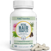 VITAL NUTRITIVE Vital Hair Complex bottle on a clean surface for daily hair support.