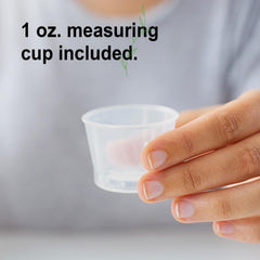 Vital Earth Minerals Cal-Mag Liquid cup shows convenient one-ounce serving for meals.