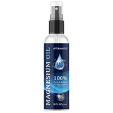 Vitamatic Pure Magnesium Oil Spray bottle in hand for quick muscle relief.