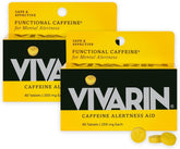 Vivarin bottle on a desk, quick caffeine boost for focus.