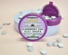 Vocal Eze lozenges close-up shows natural flavors and peppermint menthol