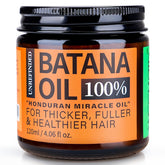 WEEMOTD Batana Oil bottle closeup showing pure Honduran formula for hair nourishment.