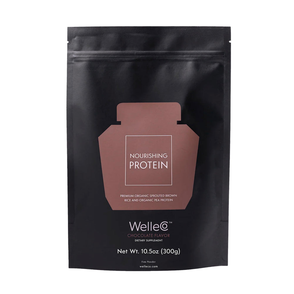 WelleCo chocolate protein powder tub label highlights plant-based energy support.