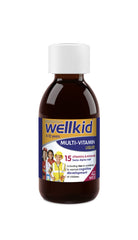 Wellkid Multi-Vitamin Liquid label close-up showing nutrients for growth support.